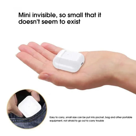 Mini wireless headphones in hand, showcasing compact design and portability without active noise cancellation.