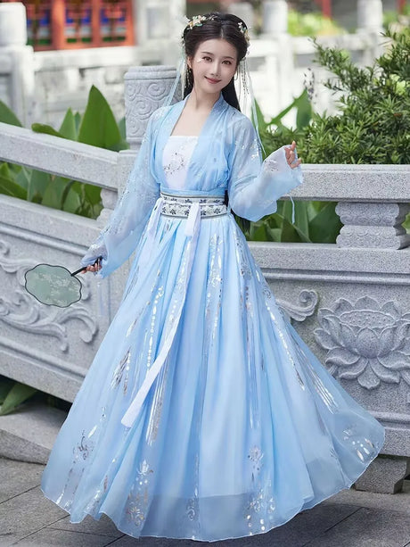 Woman wearing a blue Tang Dynasty Hanfu costume, showcasing elegant design and traditional style.