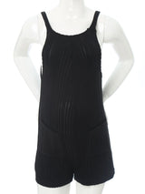 Sleeveless ribbed maternity jumpsuit in black, designed for comfort and style during pregnancy.