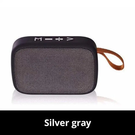 Portable outdoor Bluetooth 5.0 mini speaker in silver gray with handle for easy carrying.