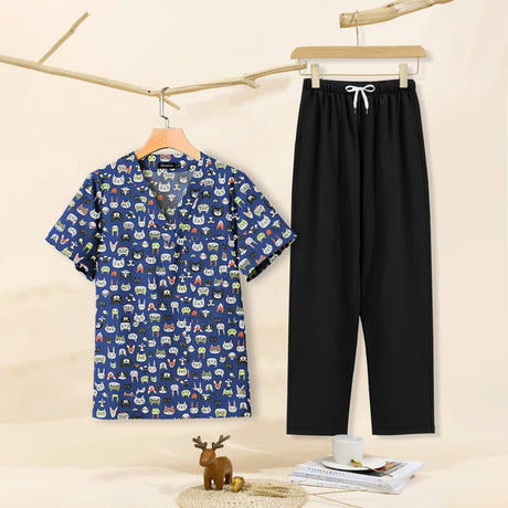 Cartoon print dental scrubs featuring a V-neck top and black pants for pet grooming and beauty salons.