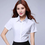 KoreLux™ white short sleeve shirt for women, featuring a slim fit and turn-down collar, perfect for youthful office style.
