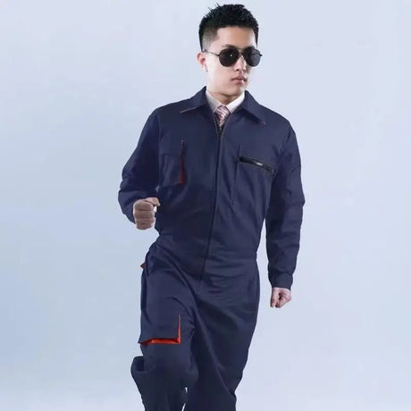 Man in mechanic welding coveralls, featuring windproof and waterproof fabric, ideal for auto repair and utility work.