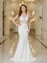 Elegant MisShow white mermaid wedding dress featuring lace, pearls, and a stunning backless design.