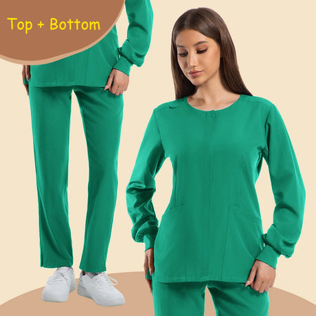 Women's long sleeve jogging style scrubs in green, featuring pockets and paired pants, ideal for medical professionals.