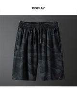 شورت جري رجالي بمقاسات كبيرة - قماش شبكي مموه