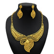 Luxury Indian bridal jewelry necklace set with intricate design, featuring matching earrings, ideal for weddings.