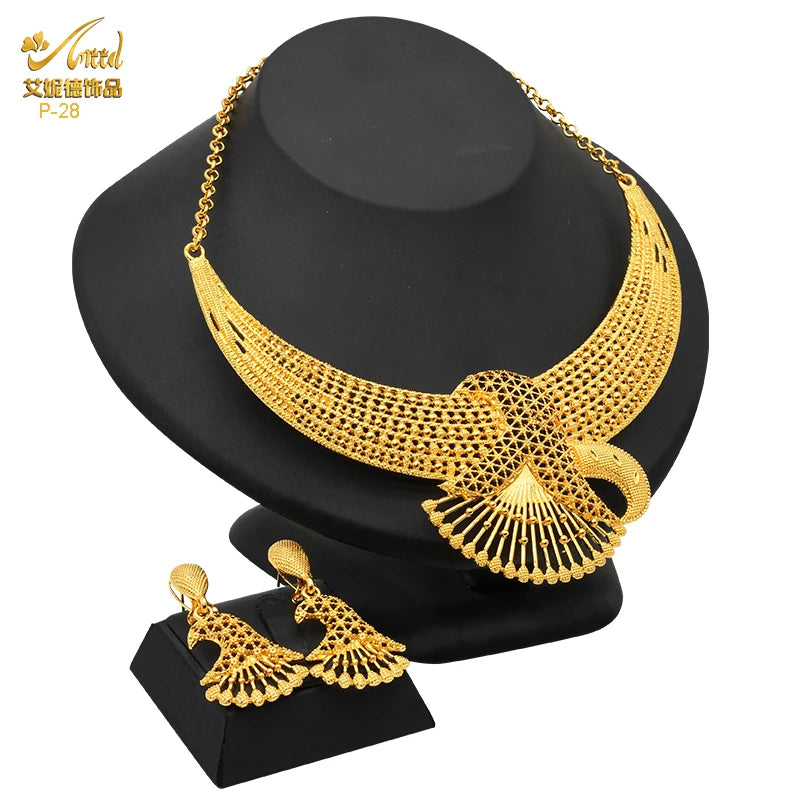 Luxury Indian bridal jewelry set featuring 24K gold plated necklace and earrings, ideal for weddings.