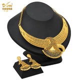 Luxury Indian bridal jewelry set featuring 24K gold plated necklace and earrings, ideal for weddings.