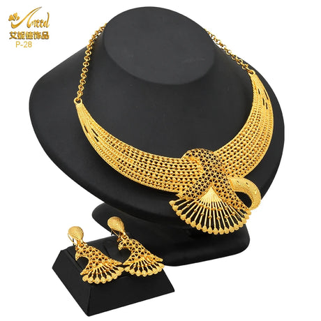 Luxury Indian bridal jewelry set featuring 24K gold plated necklace and earrings, ideal for weddings.