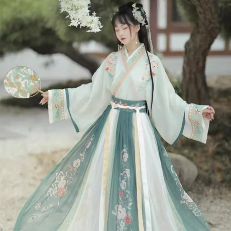 Elegant Hanfu traditional dress for women, perfect party outfit, featuring intricate floral details and flowing design.