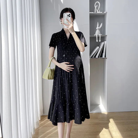 Polka dot Korean maternity dress in black, showcasing high-waist design, perfect for summer wear.