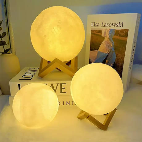 LED Moon Galaxy Book Light set on books, creating a cozy and decorative ambiance for any room.