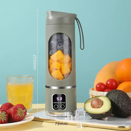 Portable 450ml fruit juicer with fruits, measuring 255mm tall and 78mm wide, perfect for smoothies and juices.