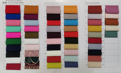 Color swatches featuring various fabrics for wedding dresses by Msikoods, showcasing a range of hues and textures.