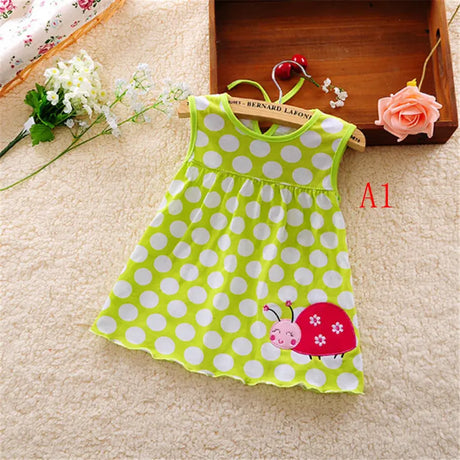 Cute baby girl dress with polka dots and ladybug design, perfect for summer, suitable for newborns to 2 years.
