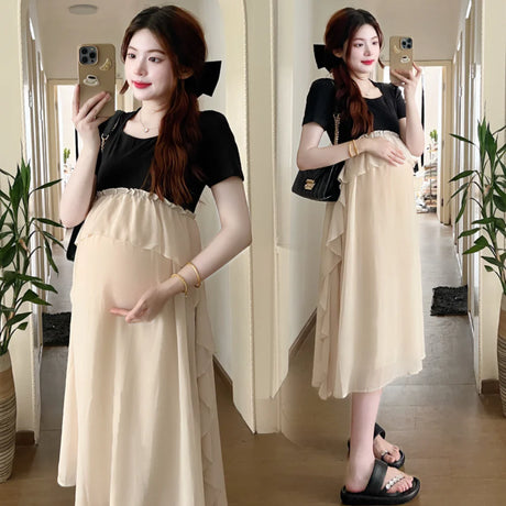 Short sleeve maternity dress featuring a black top and beige skirt, ideal for casual summer photoshoots.