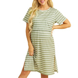 Woman modeling a striped short sleeve maternity dress in olive green, perfect for summer wear.