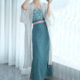 Women wearing a Song Dynasty Hanfu Retro three-piece outfit with floral patterns and elegant design.