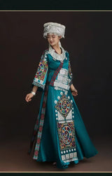 Women wearing a beautiful Miao embroidery suit, showcasing intricate patterns and vibrant colors for festival occasions.