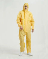 Unisex chemical resistant work coverall, waterproof yellow protective suit for utility and safety.