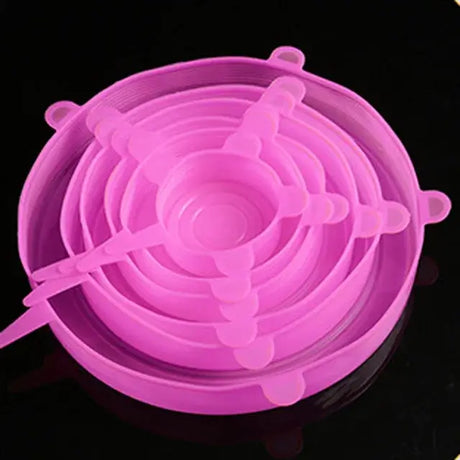 6 pieces of pink silicone stretch lids designed for kitchen and microwave use, safe and chemical-free.