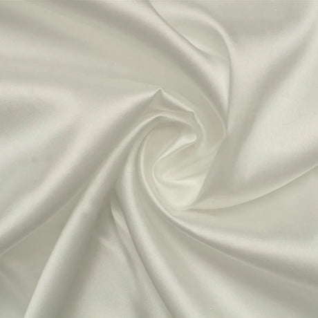 Smooth white satin fabric showcasing a spiral design, ideal for elegant wedding dresses.