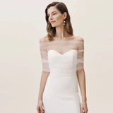 Model wearing VG73 sheer wedding jacket bolero over a strapless wedding dress, perfect for bridal occasions.