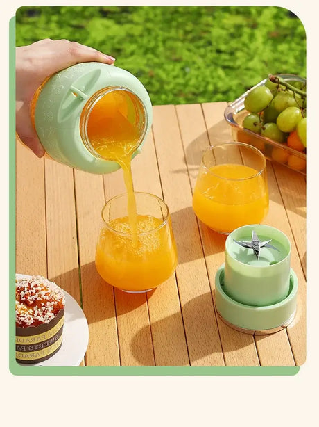 Juicing bucket pouring fresh orange juice into glasses outdoors with fruits on a table.
