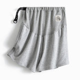 Plus size adjustable maternity shorts in grey, featuring a loose fit and comfortable elastic waistband.