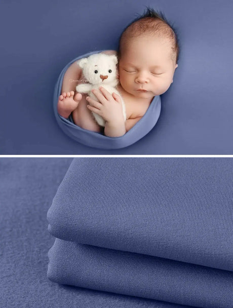 Newborn soft wrap blanket in calming blue, featuring a baby sleeping with a teddy bear, perfect for photography.