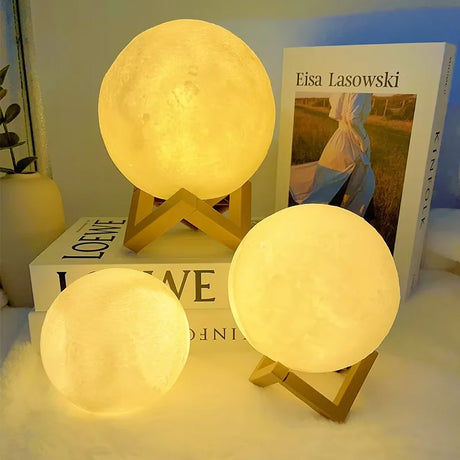 LED Moon Galaxy Book Light on display, featuring three glowing moon lamps for perfect home decor and gifts.