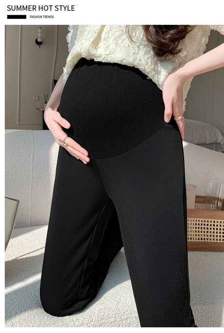 Y2K bootcut maternity pants in black, featuring comfortable ice silk fabric for summer fashion.