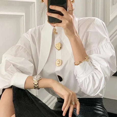 Model showcasing PearlEdge™ Pearl-Button shirt in white, featuring chic buttons and loose fit for Y2K style.