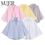 WideLine™ oversized striped shirts for women in pink, yellow, blue, white, and gray, featuring turn-down collars and loose fit.