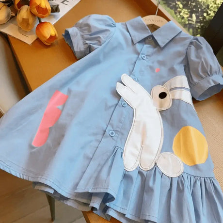 Summer girls dress in blue with cartoon design, featuring a playful rabbit, perfect for kids aged 4-6.