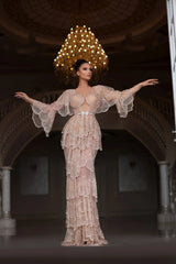 Elegant Arabic nude stone wedding gown with tiered sleeves, perfect for special occasions. Floor-length style with intricate details.