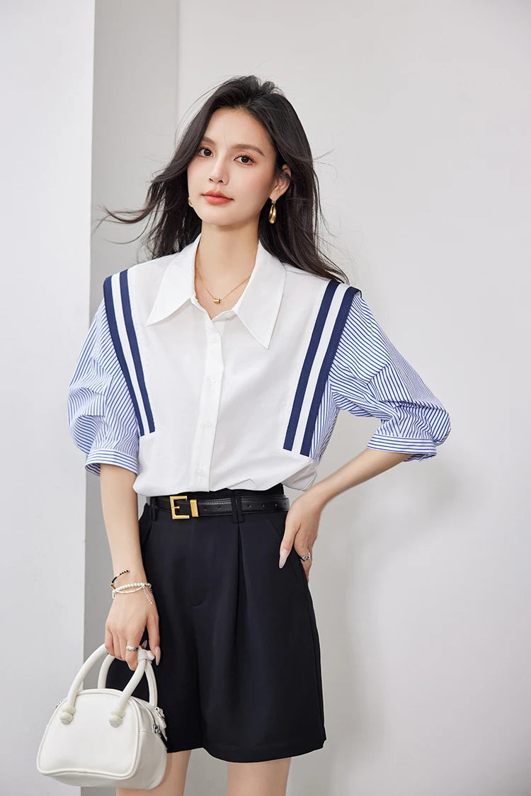 Model wearing StripeMuse™ Colorblock Chiffon Shirt with navy and white stripes, styled casually with a black skirt.
