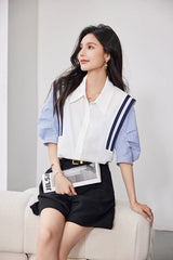 Model showcasing a stylish colorblock chiffon shirt paired with shorts, ideal for office casual looks.