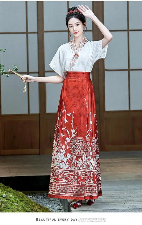 Traditional Hanfu oversized embroidered blouse in red and white, showcasing elegant Chinese design, perfect for women.
