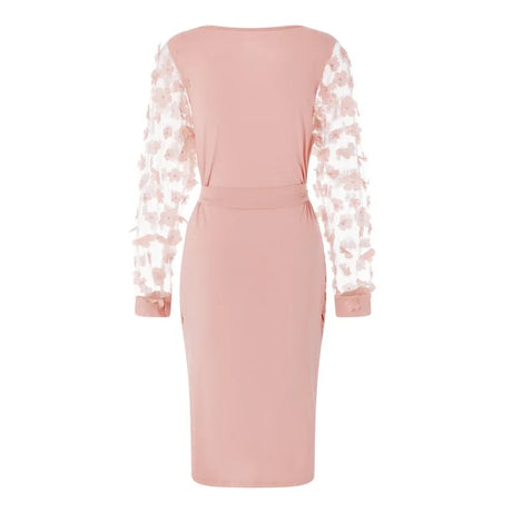 Back view of a vintage mesh floral maternity gown in soft pink, featuring full sleeves and knee-length design.