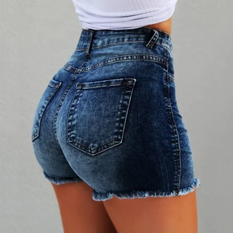 ColorTassel™ – Distressed Denim Hot Pants (Tassel-Trim, Multi-Color & Festival Vibe)