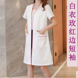 Custom logo spa beauty uniform white short sleeve lab coat with pockets for women in salon and medical use.