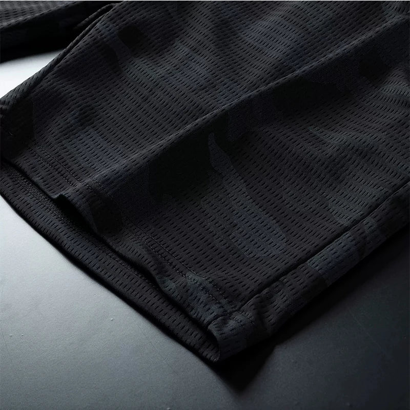 شورت جري رجالي بمقاسات كبيرة - قماش شبكي مموه