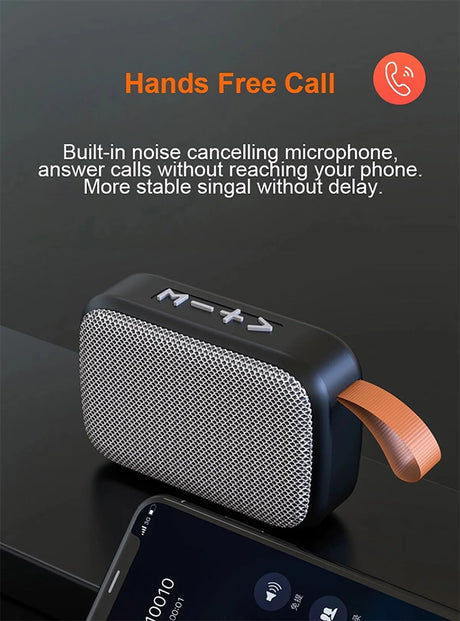 Portable Bluetooth mini speaker with built-in microphone for hands-free calls and noise cancellation features.