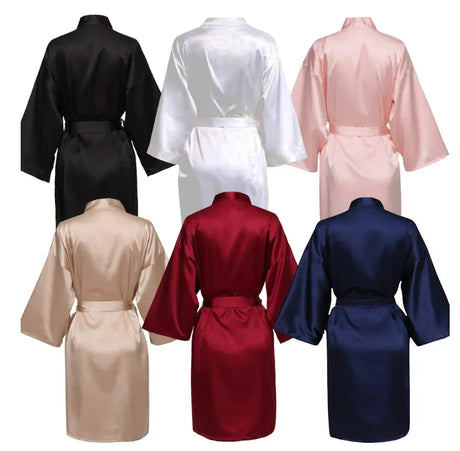 Variety of satin kimonos in black, white, pink, beige, red, and navy colors, featuring short sleeves and tie belts.