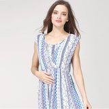 Sleeveless round neck cotton nursing dress in striped pattern, perfect for summer maternity wear.