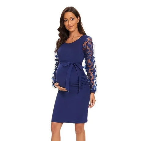 Vintage floral maternity gown in navy blue with lace sleeves, designed for summer photo shoots.