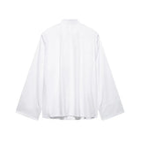 Back view of the EmbroiChic™ elegant white long sleeve embroidery shirt for women, featuring a stand collar and regular fit.