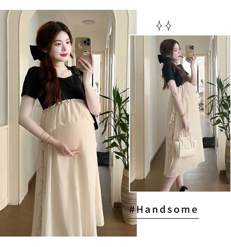 Model wearing a short sleeve maternity dress in a casual style, showcasing a solid color design.